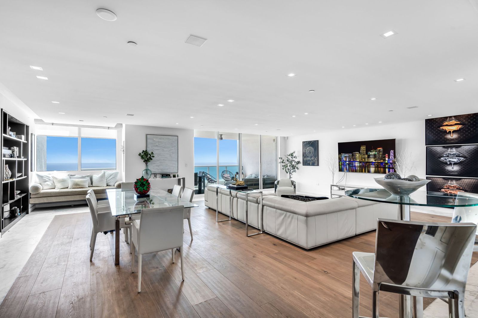 Corner living room with wraparound glass and ocean views